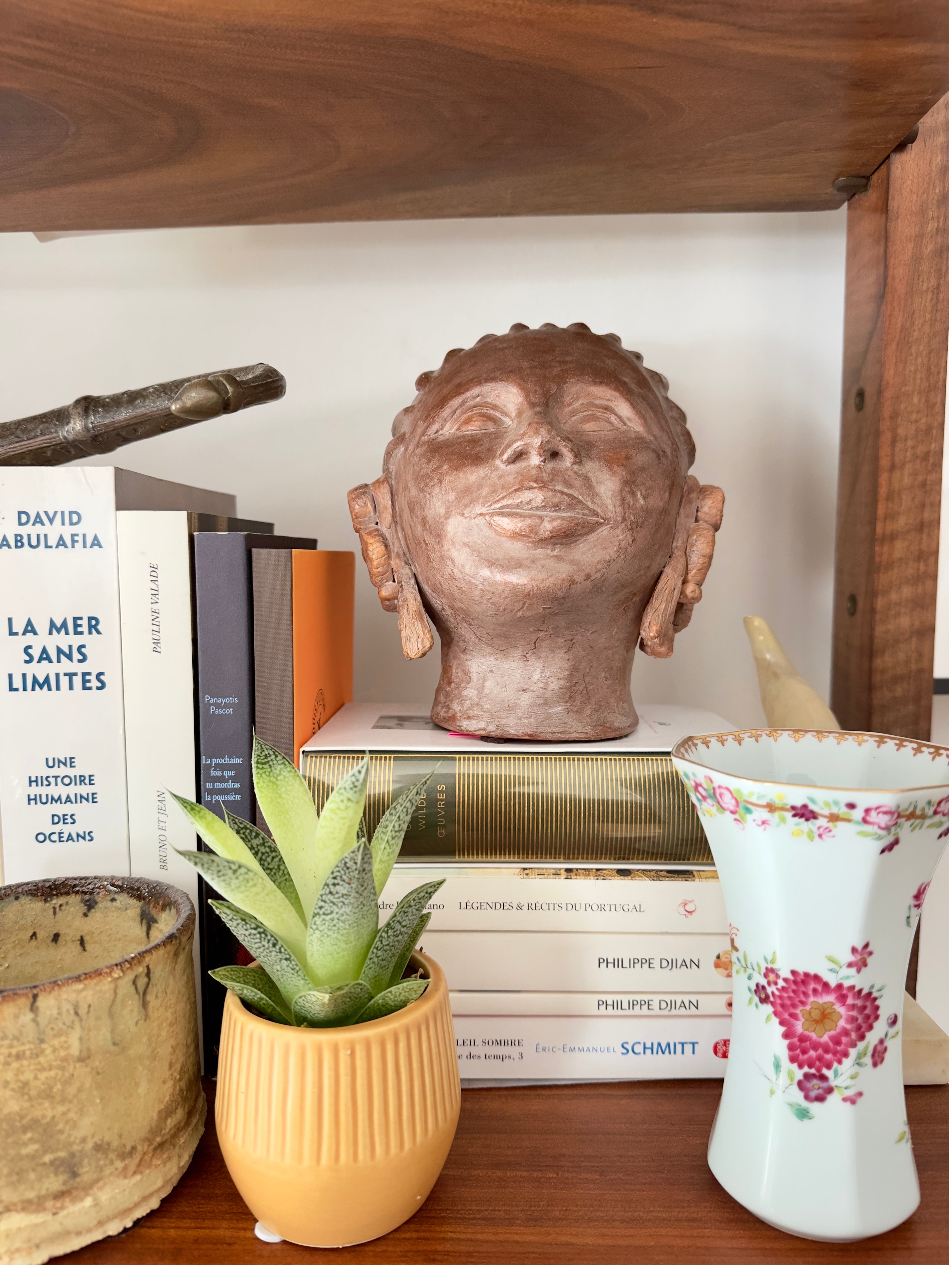 Busto feminino em terracota