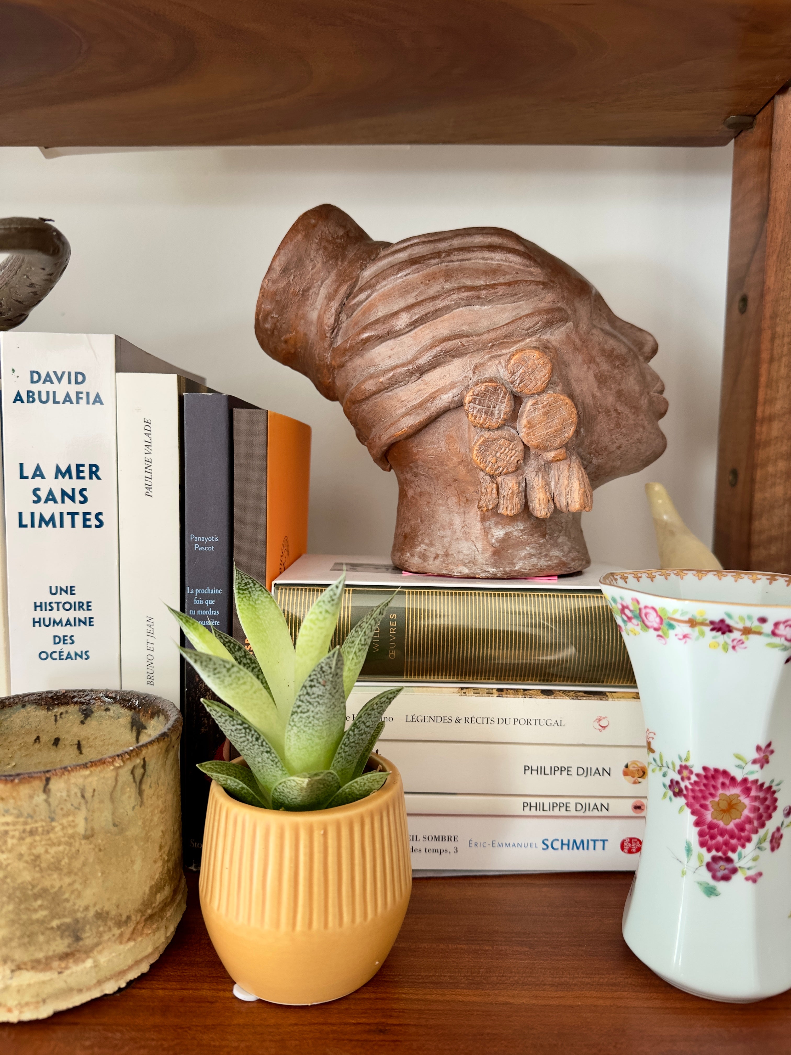 Busto feminino em terracota